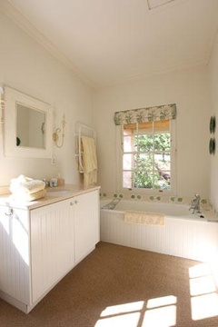 Stables bathroom with both a bath and a separate shower